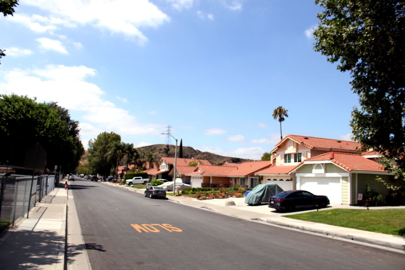 Residential street of single-family homes in Castaic, Santa Clarita, with hillside views